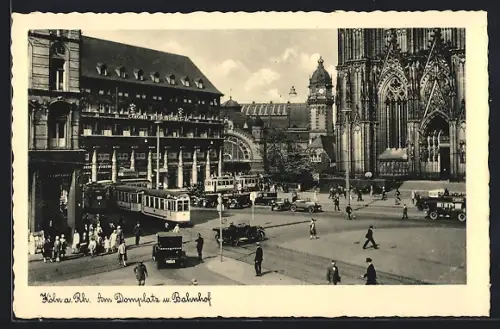AK Köln am Rhein, Strassenbahn am Domplatz und Bahnhof
