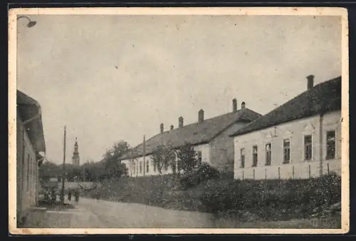 AK Ökörmezö, Strassenpartie mit Turm