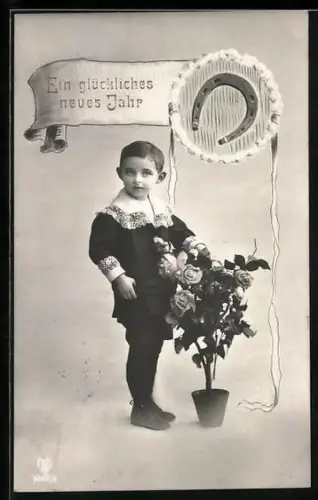 Foto-AK HB Nr. 6663/3: Kleiner Junge neben einem Rosenbusch