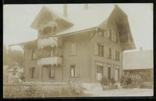 Foto-AK Langnau /BE, Mehrstöckiges Haus mit Ladengeschäft für Futtermittel