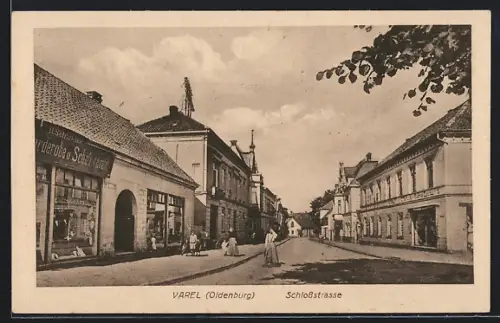 AK Varel i. Oldenburg, Schlossstrasse mit Schreibwaren-Geschäft