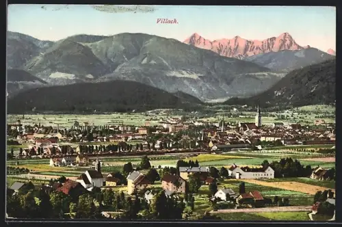 AK Villach, Ortspanorama mit Blick auf die Gebirgskette