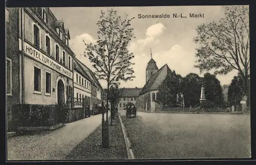AK Sonnewalde N.-L., Markt mit Kutsche