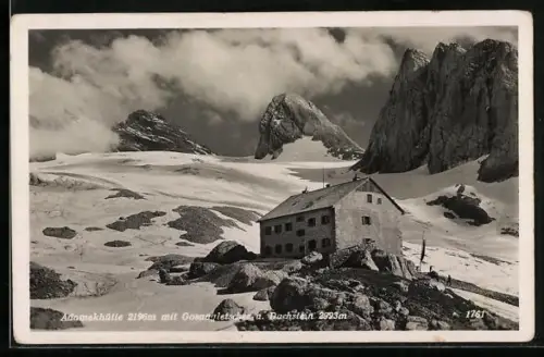 AK Adamekhütte, Berghütte mit teilweise mit Schnee bedeckter Umgebung