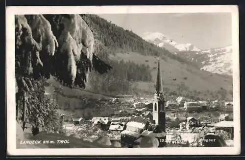 AK Landeck /Tirol, Teilansicht mit Kirche im Schnee