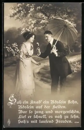 Foto-AK PFB Nr. 2144: Galanter Herr überreicht der Dame seines Herzens eine Blume