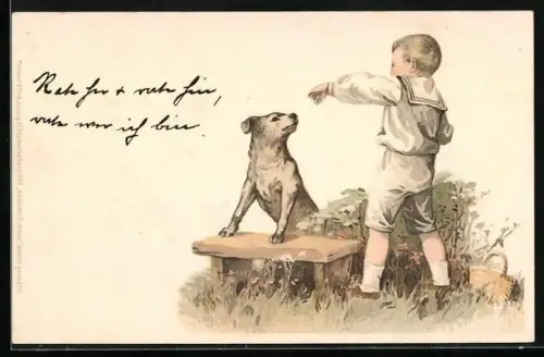 AK Kleiner Junge versucht seinem Hund Tricks bei zu bringen
