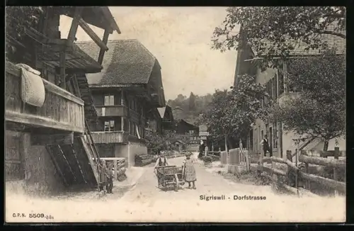 AK Sigriswil, Strassenpartie mit Gebäudeansicht und Kindern