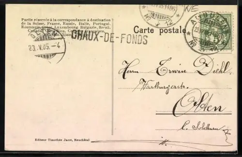 AK Chaux-de-Fonds, Strassenpartie im Osterei-Rahmen eingerahmt von Osterküken, Joyeuses Paques