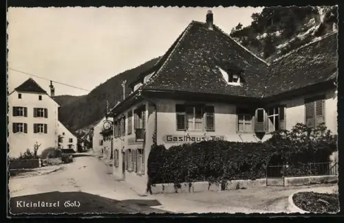 AK Kleinlützel /Sol., Gasthaus z. Tell mit Strassenpartie