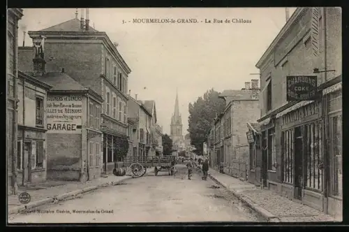 AK Mourmelon-le-Grand, La Rue de Châlons animée avec charrette et commerces
