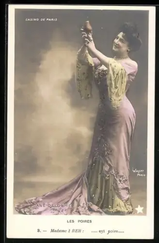 Foto-AK Walery, Paris: Elegante Dame betrachtet eine Birne, Les Poires