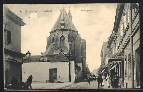 AK Wiener Neustadt, Bahngasse mit Gasthaus von H. Jahn und Kirche