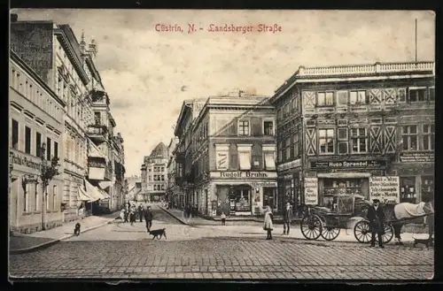 AK Cüstrin /N., Landsberger Strasse mit Geschäft von Rudolf Brunn