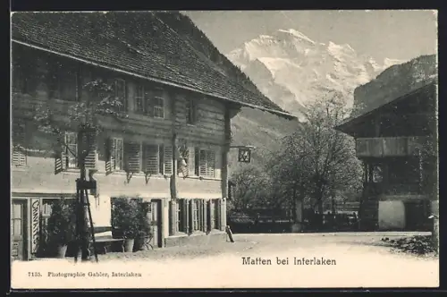 AK Matten, Strassenpartie mit Bergblick