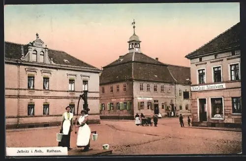 AK Jessnitz i. Anh., Rathaus und Kolonialwarenhandlung von Albin Seidel