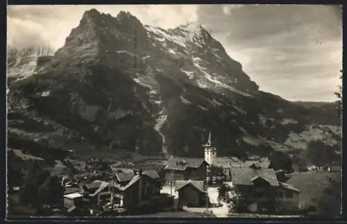 AK Grindelwald, Strassenpartie mit Kirche und Eiger