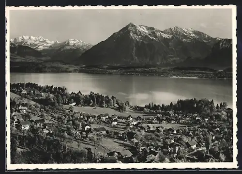 AK Hünibach bei Thun, Teilansicht mit Thunersee, Blümlisalp und Niesen