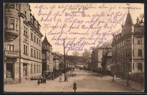 AK Copitz a. Ebe., Schulstrasse mit Geschäft von R. Gütermuth