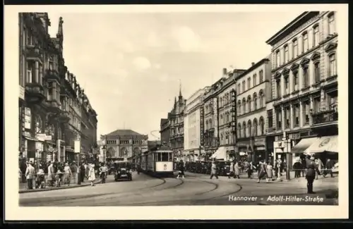 AK Hannover, Strasse mit Geschäften und Strassenbahn