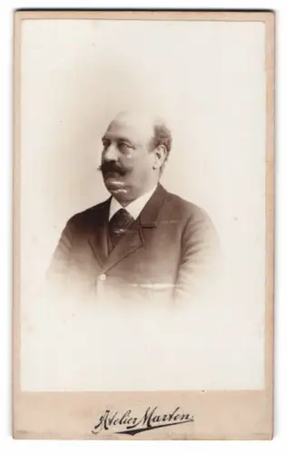 Fotografie August Marten, Bockenem, Porträt eines Mannes mit Schnurrbart