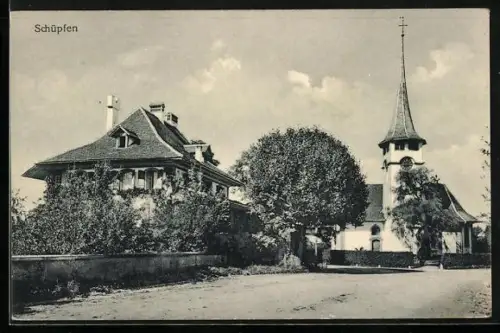AK Schüpfen, Strassenpartie mit Kirche