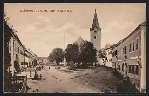 AK Hellmonsödt /O.-Oe., Strassenpartie mit Kirche