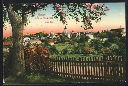 AK Enns /Ob. Oe., Ortsansicht aus dem Grünen mit blühendem Baum