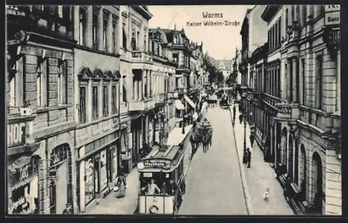 AK Worms, Strassenbahn in der Kaiser Wilhelm Strasse mit Geschäften