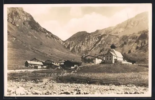 Foto-AK Stuben, Ortsansicht mit Flexenstrasse