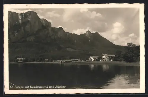 AK St. Lorenz /O.-Oe., Uferpartie mit Drachenwand und Schober