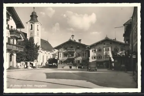 AK St. Johann, Hauptplatz mit Geschäft Julius Mein, Zahnatelier und Kirche