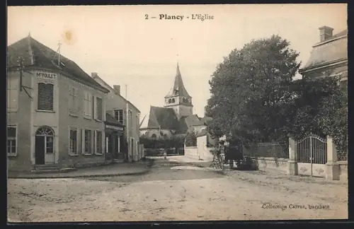 AK Plancy, L`Église et la rue principale avec des bâtiments historiques
