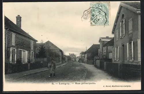AK Lusigny, Rue principale avec maisons en briques et passants