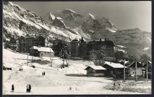 AK Wengen, Ortsansicht im Schnee mit Jungfrau