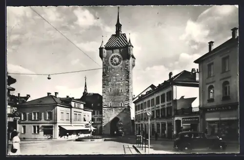 AK Baden, Strassenpartie am Tor mit Kaufhaus