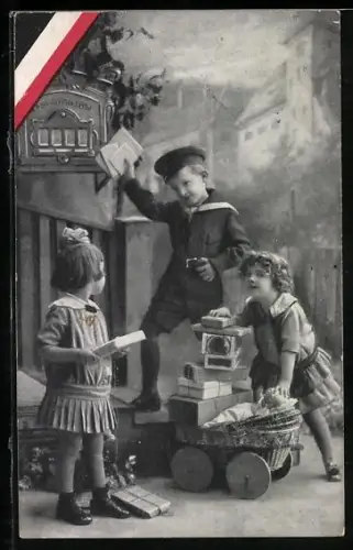 AK Kinder mit Paketen am Postkasten