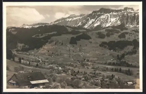 AK Schwanden ob Thunersee, Ortsansicht mit Bergpanorama