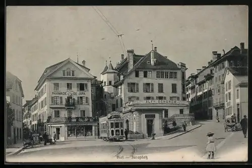 AK Biel, Juraplatz mit Jura-Apotheke, Strassenbahn mit Maggi-Werbung