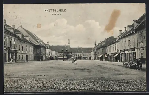 AK Knittelfeld, Hauptplatz mit Geschäften und Denkmal