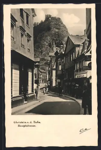 AK Oberstein a. d. Nahe, Hauptstrasse mit Geschäften und Ruine