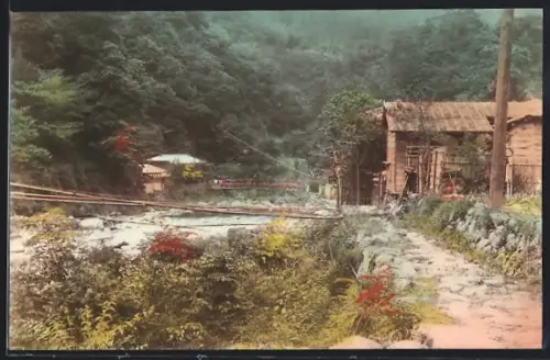 AK Okayama, Flusspartie mit Steg und Gebäuden