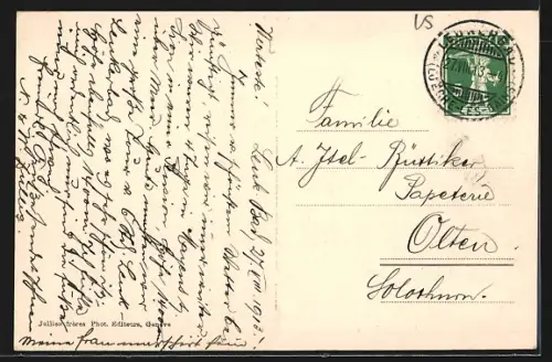 AK Loueche-les-Bains, Ortsansicht mit Bach und Bergen