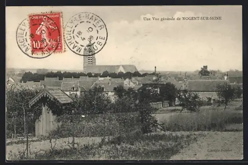 AK Nogent-sur-Seine, Une vue générale de la ville avec l`église en arrière-plan