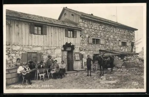 AK Simonyhütte, Hüttenwirt mit Gästen und Packesel