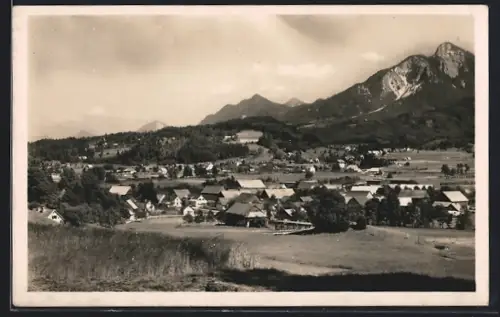 AK Faak am See, Totalansicht mit Bergen im Hintergrund