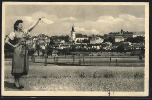 AK Hollabrunn, Ortsansicht, Frau im Dirndel winkt