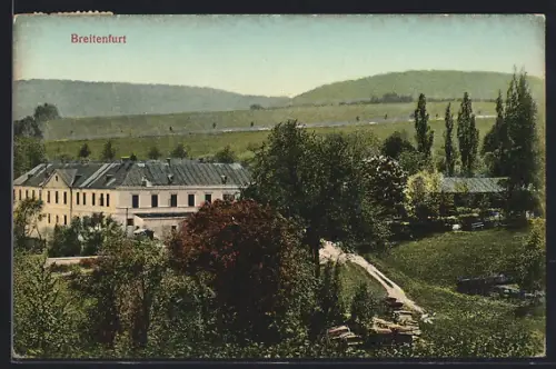 AK Breitenfurt, Grosses Gebäude im Grünen mit Schuppen u. Holzlager