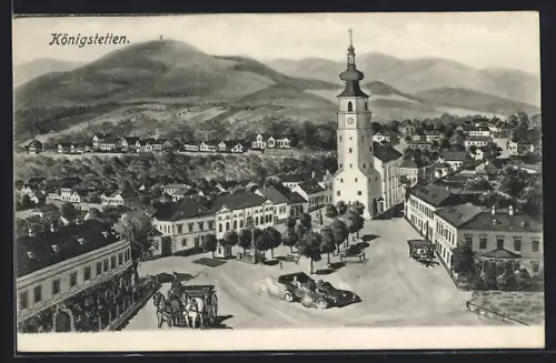 AK Königstetten, Ortsansicht mit Platz aus der Vogelschau, Kirche, Denkmäler