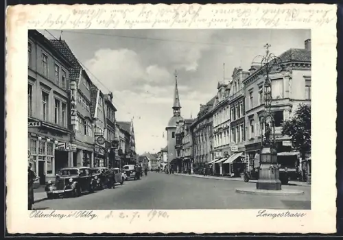 AK Oldenburg i. Oldbg., Langestrasse mit Geschäften und Autos